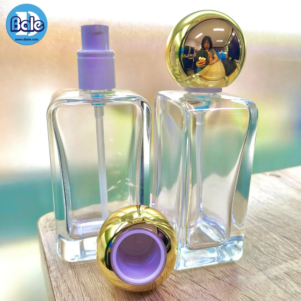 jpf224 100ml. ขวดน้ำหอม ทรงเหลี่ยม หัวปั๊มฝาครอบทรงกลมสีทองเงา