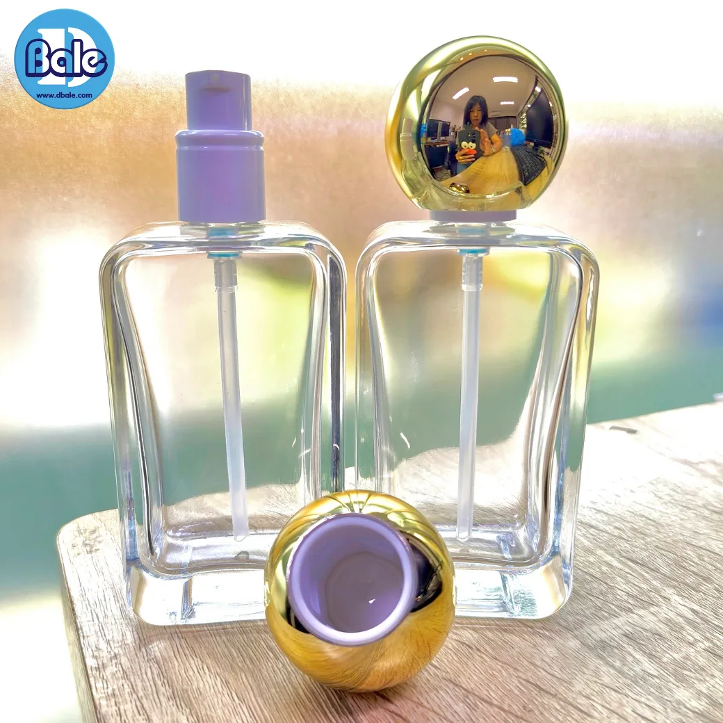 jpf224 100ml. ขวดน้ำหอม ทรงเหลี่ยม หัวปั๊มฝาครอบทรงกลมสีทองเงา